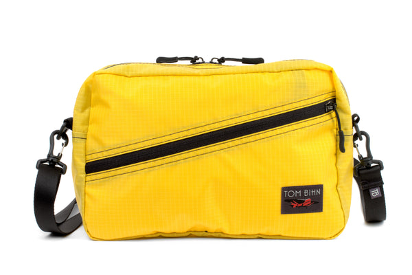 A Packing Cube Shoulder Bag in Marigold (yellow with light yellow grid) 210 Cerylon with 1" Shoulder Strap attached.